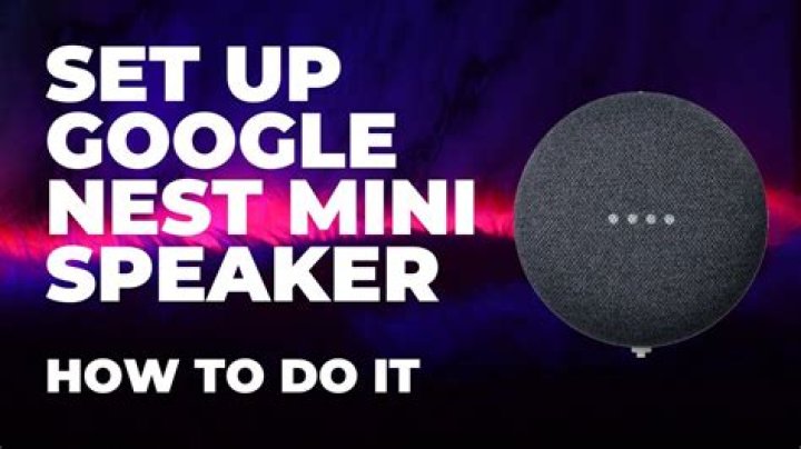 Google Nest Mini speaker on a blue backdrop